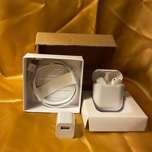 Afans wireless bluetooth white earbuds w/charging case, cord & plug. Never used